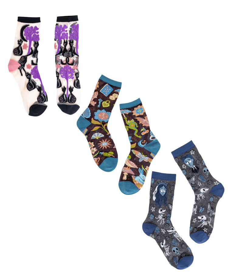 The Whimsigoth sheer sock bundle by Sock Candy featuring sheer mesh pairs detailed with purple nocturnal cats, dark fairytale elements, and blue Corpse Bride graphics.