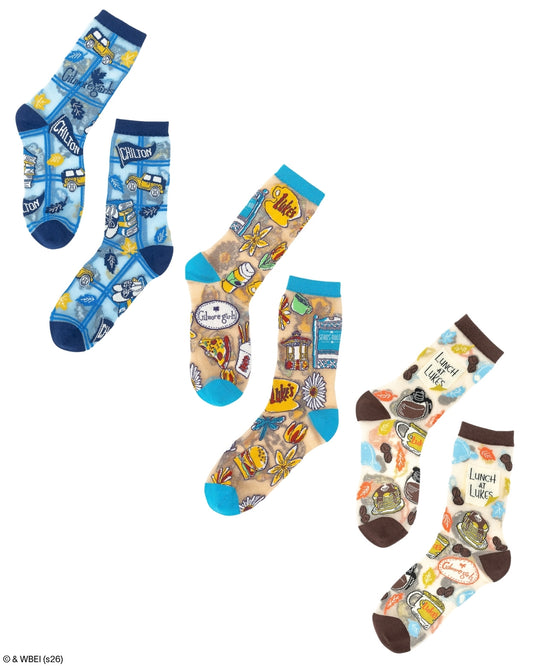 Three pairs of gilmore girls fashioin sheer socks with chilton, stars hollow, and Luke's diner icons. 