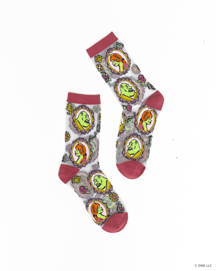 A pair of Shrek sheer socks designed by Sock Candy with portraits of Shrek and Princess Fiona surrounded by roses and daisies on a white background.